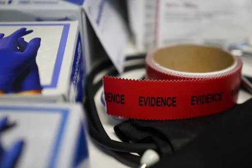 Evidence tape is seen with a Sexual Assault Evidence Collection Kit in an examination room, Wednesday, Aug. 31, 2022, in Austin, Texas. After a Texas law banning abortions past about six weeks, even in cases of rape or incest, went into effect a year ago, Gov. Greg Abbott said the state would strive to "eliminate all rapists from the streets." (AP Photo/Eric Gay)