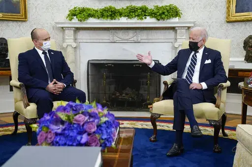President Joe Biden meets with Israeli Prime Minister Naftali Bennett in the Oval Office of the White House, Friday, Aug. 27, 2021, in Washington. (AP Photo/Evan Vucci)