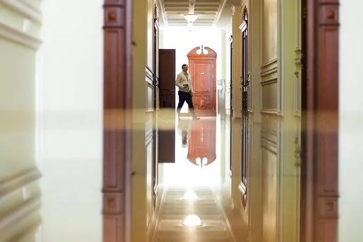 Ukrainian Foreign Minister Dmytro Kuleba arrives for an interview with Associated Press at the Foreign Affairs Ministry in Kyiv, Monday, April 25, 2022. Ukraine’s foreign minister is urging U.N. Secretary-General Antonio Gutteres to press Russia for an evacuation of the besieged port of Mariupol when he visits Moscow on Tuesday. Foreign Minister Dmytro Kuleba told The Associated Press in an interview Monday such a move “is really something that the U.N. is capable to do.” (AP Photo/Francis