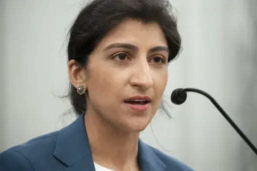 Lina Khan, nominee for Commissioner of the Federal Trade Commission (FTC), speaks during a Senate Committee on Commerce, Science, and Transportation confirmation hearing, April 21, 2021 on Capitol Hill in Washington. Khan, the head of the Federal Trade Commission says she’ll continue to lead a robust agenda of actions and policies to help safeguard the data privacy of children online. The work will include toughened enforcement of protections under a long-standing law governing kids’ online 