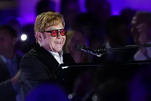 Elton John performs on the South Lawn of the White House in Washington, Friday, Sept. 23, 2022. John is calling the show "A Night When Hope and History Rhyme," a reference to a poem by Irishman Seamus Heaney that President Joe Biden often quotes. (AP Photo/Susan Walsh)