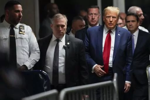 Former President Donald Trump leaves Manhattan criminal court, Feb. 15, 2024, in New York. Prosecutors said Thursday, March 14, that they’re open to delaying the start of Trump’s New York hush-money criminal trial to give the former president’s lawyers time to review evidence that was only recently turned over. Jury selection in the trial is scheduled to begin March 25. The judge has yet to rule on the request. (AP Photo/Mary Altaffer, File)