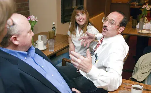 Wichita City Council candidate Mark Gietzen, right, visits with Sedgwick County Commissioner Richard Ranzau during an election watch party in Wichita, Kan. on Tuesday, April 5, 2011. Gietzen, a hard-right anti-abortion activist from Wichita who also promotes election conspiracies, has helped raise money to pay for a recount vote on an abortion amendment in 2022. (Mike Hutmacher/The Wichita Eagle via AP)