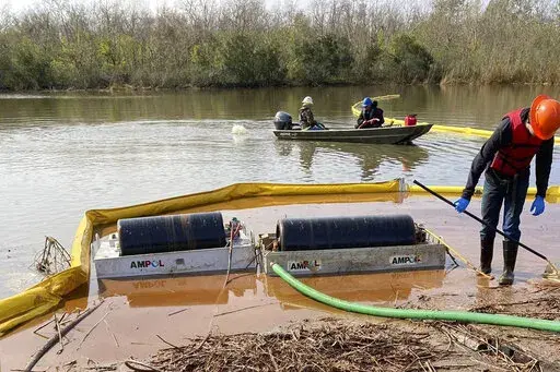 This undated photo provided by the Louisiana Department of Environmental Quality on Wednesday, Jan. 12, 2022, shows cleanup work at the site where more than 300,000 gallons of diesel spilled on Dec. 27, 2021, just outside New Orleans. An October 2020 inspection revealed external corrosion along a 22-foot section of pipe in the same area as the spill. But documents show repairs were delayed after a subsequent inspection indicated the corrosion was not bad enough to require work immediately under 