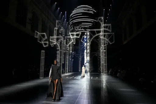 A model wears a creation for the Fendi Spring-Summer 2022 Haute Couture fashion collection, in Paris, Thursday, Jan. 27, 2022. (AP Photo/Thibault Camus)
