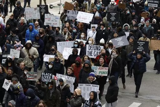 A crowd of over 300 people protest the killing of Patrick Lyoya in Grand Rapids, Mich., April 16, 2022. The 26-year-old Congolese refugee was fatally shot by a Grand Rapids police officer after resisting arrest during a traffic stop on April 4. (Eric Seals /Detroit Free Press via AP)