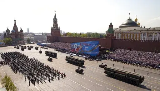 Russian military vehicles roll down Red Square Red Square during a rehearsal for the Victory Day military parade in Moscow, Russia, on May 7, 2019. Some in the West think Russian President Vladimir Putin may use the Victory Day on May 9 when Russia celebrates the defeat of Nazi Germany in World War II to officially declare that war is underway in Ukraine and announce a mobilization _ the claim rejected by the Kremlin. (AP Photo/Alexander Zemlianichenko, Pool, File)