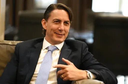 U.S. Envoy for Energy Affairs Amos Hochstein, meets with Outgoing Lebanese Prime Minister Najib Mikati, in Beirut, Lebanon, June 14, 2022. President Joe Biden's point man for global energy problems knows, he says, that transitioning away from the climate-wrecking pollution of fossil fuels is the only way to go. As a U.S. energy adviser, Amos Hochstein advocates urgently for renewable energy, for energy-smart thermostats and heat pumps. (AP Photo/Hussein Malla, File)