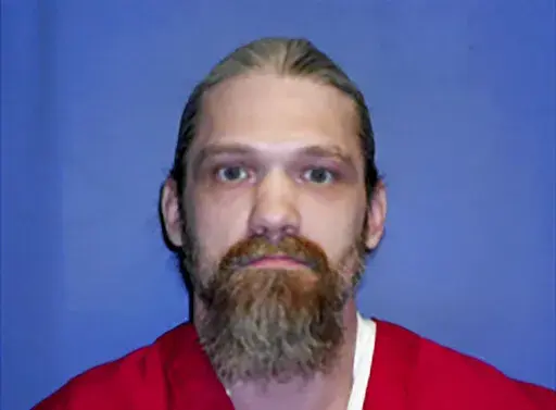 This undated file photo provided by the Mississippi Department of Corrections shows Blayde Grayson. The state attorney general’s office said a judge will hold a hearing April 7, 2022, to determine if Grayson truly wants to request an execution date and if he is mentally competent to waive his appeals in the case. (Mississippi Department of Corrections via AP, File)