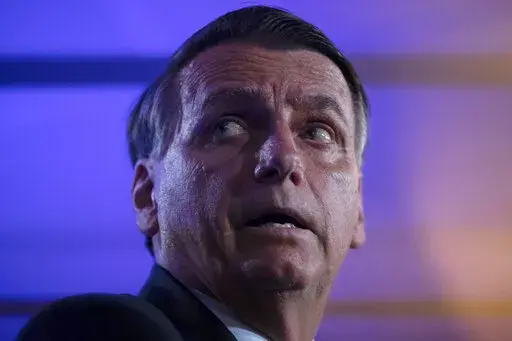 Brazilian President Jair Bolsonaro attends a press conference in Rio de Janeiro, Brazil, Oct. 29, 2022. Bolsonaro said he would only leave the Brazilian presidency when he was dead, jailed or ready for his second term. But Bolsonaro’s Oct. 30 loss to Luiz Inacio Lula da Silva set off two months of relative silence for the self-styled standard-bearer of the Brazilian conservative movement. (AP Photo/Bruna Brado, File)