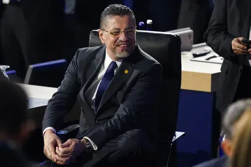 Costa Rica President Rodrigo Chaves Robles smiles during the opening plenary session at the Summit of the Americas June 9, 2022, in Los Angeles. Costa Rica has been reeling from unprecedented ransomware attacks disrupting everyday life in the Central American nation for the last two months. (AP Photo/Marcio Jose Sanchez, File)