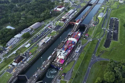 A cargo ship traverses the Agua Clara Locks of the Panama Canal in Colon, Panama, Sept. 2, 2024. (AP Photo/Matias Delacroix, File)