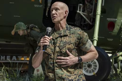 This image provided by the U.S. Marine Corps shows U.S. Marine Corps Lt. Gen. James Glynn speaking during the Wounded Warrior Regiment change of command at the National Museum of the Marine Corps in Triangle, Va., July 14, 2023. The Pentagon has sent military advisers to Israel to aid in its war planning and is speeding multiple sophisticated air defense systems to the Middle East days ahead of an anticipated ground assault into Gaza. One of the officers leading the assistance is Glynn, who prev