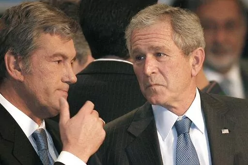 Ukraine's President Viktor Yushchenko talks with US President George W.Bush, at the NATO Summit conference in Bucharest, Thursday April 3, 2008. NATO returns on Tuesday, Nov. 29, 2022 to the scene of one of its most controversial decisions and where it intends to repeat its vow that Ukraine, now suffering through the tenth month of a war against Russia, will be able to join the world's biggest military alliance one day.(AP Photo/Vadim Ghirda, File)