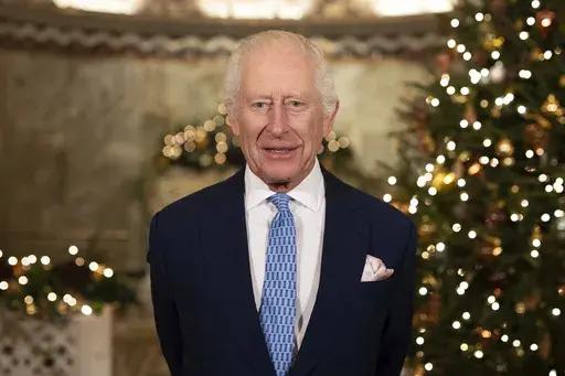 Britain's King Charles III speaks during the recording of his Christmas message at the Fitzrovia Chapel in central London, England, Wednesday, Dec. 11, 2024. (Aaron Chown/PA via AP, Pool)