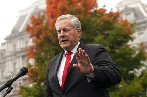 White House chief of staff Mark Meadows speaks with reporters at the White House, Wednesday, Oct. 21, 2020, in Washington. A former White House official told the House committee investigating the Jan. 6, 2021 insurrection at the U.S. Capitol that President Donald Trump's chief of staff, Mark Meadows, had been advised of intelligence reports showing the potential for violence that day, according to transcripts released late Friday night, April 22, 2022. (AP Photo/Alex Brandon, File)