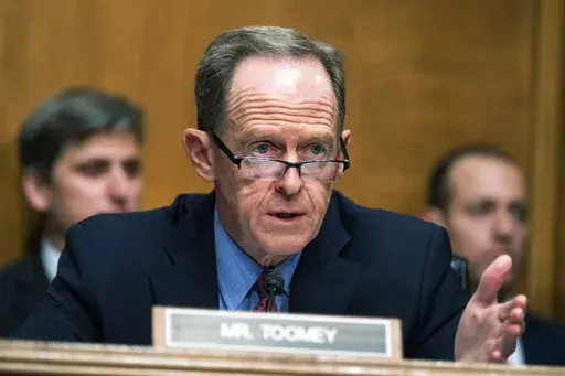 Ranking member Sen. Pat Toomey, R-Pa., speaks during a Senate Banking, Housing, and Urban Affairs Committee hearing, Tuesday, May 10, 2022, on Capitol Hill in Washington. After the latest cryptocurrency implosion, Washington appears ready to take its first steps to regulate the industry. Toomey is circulating a bill focused on regulating stablecoins, which would require stablecoin providers to have a license to operate, restrict the types of assets they carry to back those stablecoins, as well a