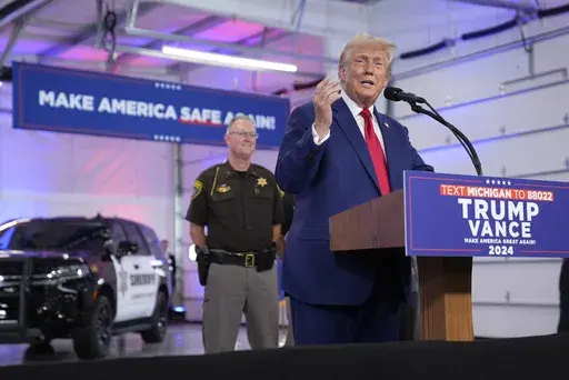 Republican presidential nominee former President Donald Trump speaks on crime and safety during a campaign event at the Livingston County Sheriff's Office, Tuesday, Aug. 20, 2024, in Howell, Mich. (AP Photo/Evan Vucci)