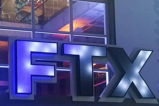 The FTX Arena logo is seen where the Miami Heat basketball team plays on Nov. 12, 2022, in Miami. The former CEO of failed crypto firm FTX Sam Bankman-Fried has been arrested in the Bahamas at the request of the U.S. government, the U.S. attorney’s office in New York said Monday, Dec. 12. (AP Photo/Marta Lavandier, File)
