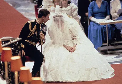 Britain's Prince Charles speaks with his bride Princess Diana, during their wedding ceremony in St. Paul's Cathedral, London, July 29, 1981. (AP Photo/File)