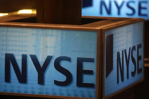 In this Aug. 28, 2009 file photo, a sign is shown at the New York Stock Exchange in New York.  Stocks are opening gingerly higher on Wall Street Friday, June 17, 2022 at the end of a brutal week. Stocks suffered several massive drops this week as markets get accustomed to the bitter medicine of higher interest rates that the Federal Reserve and other central banks are using in their battle against inflation.  (AP Photo/Frank Franklin II, file)