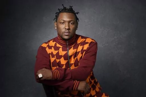 Record producer and recording artist Hit-Boy poses for a portrait, Tuesday, March 8, 2022, in Los Angeles. When Hit-Boy walks the Grammy red carpet, he expects to proudly strut into the Feb. 4, 2024 awards ceremony with his father beside him for the first time. (AP Photo/Chris Pizzello, File)