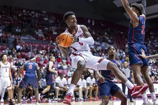 Alabama guard Jaden Bradley (0) looks for a passing outlet against Jackson State during the first half of an NCAA college basketball game, Tuesday, Dec. 20, 2022, in Tuscaloosa, Ala. (AP Photo/Vasha Hunt)