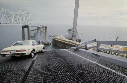 A car is halted at the edge of the Sunshine Skyway Bridge across Tampa Bay, Fla., after the freighter Summit Venture struck the bridge during a thunderstorm and tore away a large part of the span, May 9 1980. A container ship struck a major bridge in Baltimore early Tuesday, March 26, 2024, causing it to plunge into the river below. From 1960 to 2015, there have been 35 major bridge collapses worldwide due to ship or barge collision. (AP Photo/Jackie Green, File)