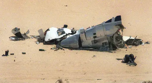 Debris of a French UTA jetliner seen in the desert of Niger, where the airliner crashed after exploding over the desert in September 1989. (AP Photo/Remy de la Mauviniere, File)