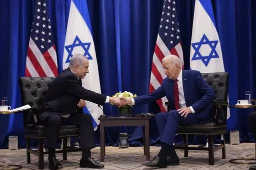 President Joe Biden meets with Israeli Prime Minister Benjamin Netanyahu in New York, Sept. 20, 2023. Less than three weeks ago, Netanyahu sat beside Biden and marveled that an "historic peace between Israel and Saudi Arabia" seemed within reach. Now, the outbreak of war between Israel and the Palestinians is threatening to delay or derail a country-by-country diplomatic push by the United States to improve relations between Israel and its Arab neighbors. (AP Photo/Susan Walsh, File)