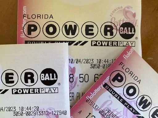 Powerball lottery tickets are displayed Oct. 4, 2023, in Surfside, Fla. Someone in Michigan has won an $842.4 million Powerball jackpot on the first day of 2024, the first time it has been won on New Year’s Day since the game’s start in 1992. (AP Photo/Wilfredo Lee, File)