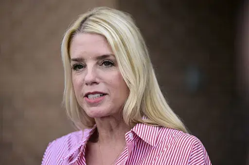 Pam Bondi, former Florida Attorney General, speaks to reporters outside an election integrity volunteer training, June 18, 2024, in Newtown, Pa. (AP Photo/Derik Hamilton, File)