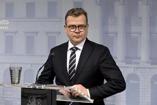 Finnish Prime Minister Petteri Orpo meets the media in Helsinki, Finland, Tuesday, Oct. 10, 2023. Finnish and Estonian gas system operators on Sunday said they noted an unusual drop in pressure in the Balticconnector pipeline after which they shut down the gas flow. The Finnish government on Tuesday said there was damage both to the gas pipeline and to a telecommunications cable between the two NATO countries. (Jussi Nukari/Lehtikuva via AP)
