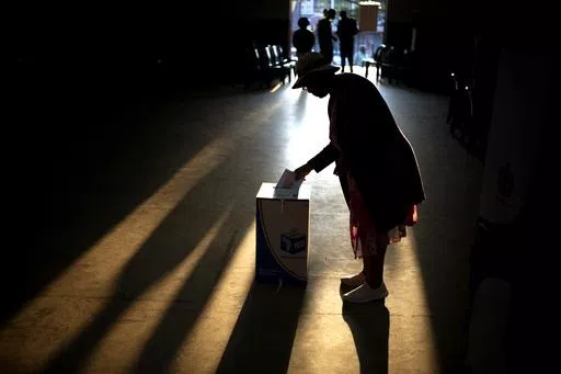 A woman casts her ballot at a polling station, during general elections in Eshowe, South Africa, Wednesday May 29, 2024. South Africans are voting in an election seen as their country's most important in 30 years, and one that could put them in unknown territory in the short history of their democracy, the three-decade dominance of the African National Congress party being the target of a new generation of discontent in a country of 62 million people — half of whom are estimated to be living i