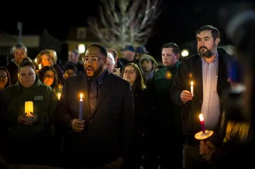 Newport News Councilman Elect John Eley, South District 3, speaks at a candlelight vigil in honor of Richneck Elementary School first-grade teacher Abby Zwerner at the School Administration Building in Newport News, Va., Monday, Jan. 9, 2023. Eley served on the Newport News School Board before being elected a councilman. Zwerner was shot and wounded by a 6-year-old student while teaching class on Friday, Jan. 6. (AP Photo/John C. Clark)