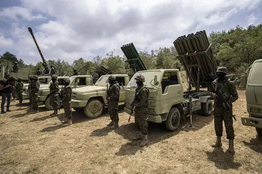 Fighters from the Lebanese militant group Hezbollah carry out a training exercise in Aaramta village in the Jezzine District, southern Lebanon, Sunday, May 21, 2023. The prospect of a full-scale war between Israel and Lebanon's Hezbollah militia terrifies people on both sides of the border, but some see it as an inevitable fallout from Israel's ongoing war against Hamas in Gaza, particularly as cease-fire negotiations have faltered. (AP Photo/Hassan Ammar, File)