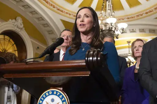 Sen. Katie Britt, R-Ala., speaks to reporters on Capitol Hill, Jan. 14, 2025, in Washington. (AP Photo/Mark Schiefelbein, File)