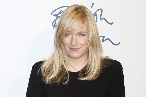 Sarah Burton arrives for the British Fashion Awards 2011 at a central London venue, on Nov. 28, 2011. French luxury fashion house Givenchy names Sarah Burton new creative director. (AP Photo/Jonathan Short, File)