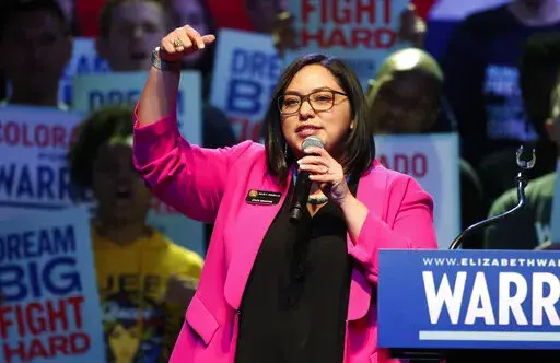 Colorado state Sen. Julie Gonzalez, D-Denver, introduces Democratic presidential candidate Elizabeth Warren at a campaign rally on Feb. 23, 2020, in Denver. Gonzalez has joined forces with two other Colorado lawmakers to introduce a bill to codify reproductive autonomy in state law including decisions about contraception and pregnancy.(AP Photo/David Zalubowski, File)