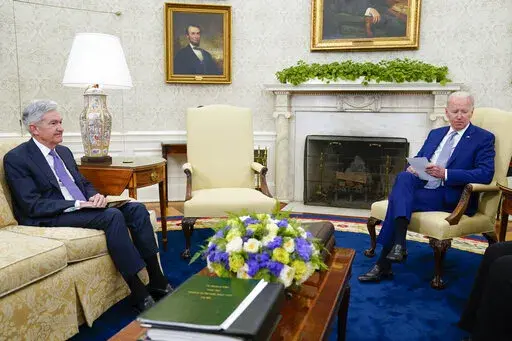 President Joe Biden meets with Federal Reserve Chairman Jerome Powell and Treasury Secretary Janet Yellen, not pictured, in the Oval Office of the White House, Tuesday, May 31, 2022, in Washington. (AP Photo/Evan Vucci)