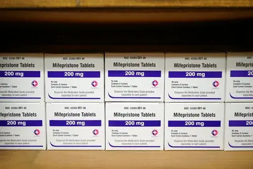 Boxes of the drug mifepristone line a shelf at the West Alabama Women's Center in Tuscaloosa, Ala., on March 16, 2022. Medication abortions became the preferred method for ending pregnancy in the U.S. even before the Supreme Court overturned Roe v. Wade (AP Photo/Allen G. Breed, File)