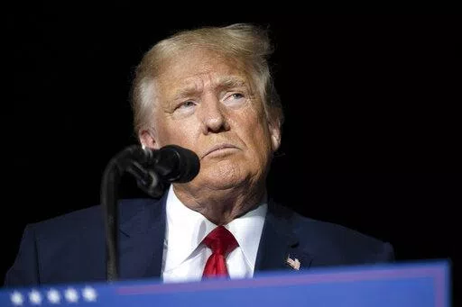 Former President Donald Trump pauses while speaking at a rally at the Minden Tahoe Airport in Minden, Nev., on Oct. 8, 2022.  (AP Photo/José Luis Villegas, Pool, File)
