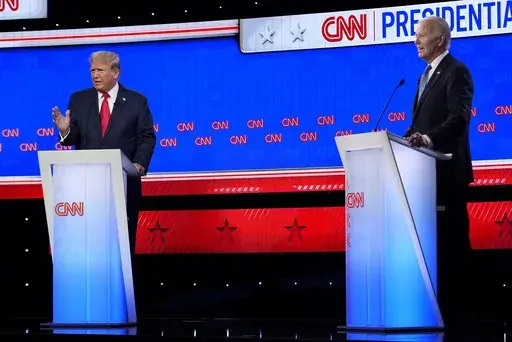 President Joe Biden, right, and Republican presidential candidate former President Donald Trump, left, during a presidential debate June 27, 2024, in Atlanta. (AP Photo/Gerald Herbert, File)