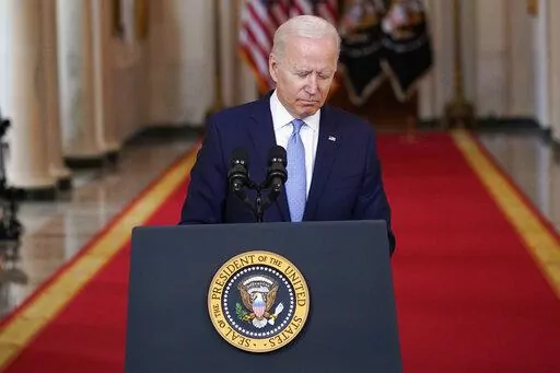 President Joe Biden finishes speaking about the end of the war in Afghanistan from the State Dining Room of the White House, Tuesday, Aug. 31, 2021, in Washington. (AP Photo/Evan Vucci)