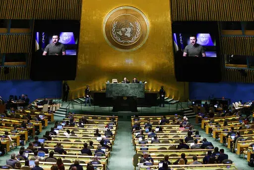 Ukrainian President Volodymyr Zelenskyy addresses the 77th session of the United Nations General Assembly, at U.N. headquarters, Wednesday, Sept. 21, 2022. (AP Photo/Jason DeCrow)