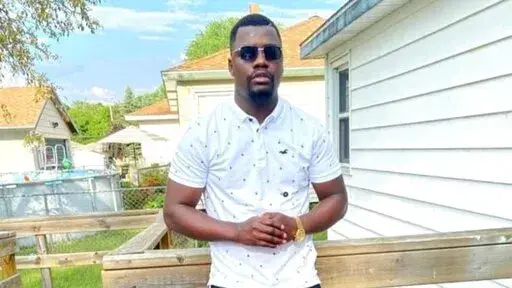 This undated photo provided by Ben Crump Law shows Patrick Lyoya. The union representing police officers in a Michigan city is defending the officer who shot Patrick Lyoya in the back of the head. Lyoya's death is "tragic," the Grand Rapids Police Officers Association said, but an "officer has the legal right to protect themselves and community in a volatile dangerous situation such as this, in order to return to his/her family at the end of their shift."(photo courtesy of Ben Crump Law via AP)