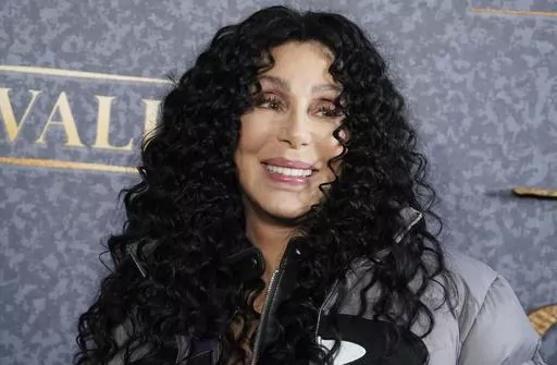 Cher arrives at the premiere of "Chevalier" in Los Angeles on rApril 16, 2023. Cher's holiday album, “Christmas,” releases Friday. (Photo by Jordan Strauss/Invision/AP, Filer)