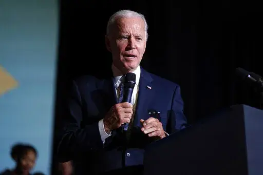 President Joe Biden speaks about student loan debt relief at Delaware State University, Friday, Oct. 21, 2022, in Dover, Del. (AP Photo/Evan Vucci)