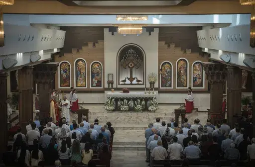 Chaldean Christians attend a service in the Mar Youssef Cathedral in Irbil, Iraq, on Sunday, July 30, 2023. Today, the number of Christians in Iraq is 150,000, compared to 1.5 million in 2003. (AP Photo/Julia Zimmermann/Metrography)