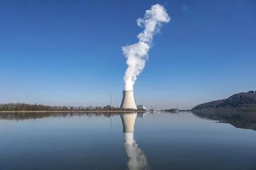 Water vapor rises from the nuclear power plant Isar II in Essenbach, Germany, March 3, 2022. Germany is shutting down this nuclear power plant and two others on Saturday, April, 2023, as part of an energy transition agreed by successive governments. (Armin Weigel/dpa via AP, File)